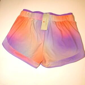 Brand new, multicolored women’s athletic shorts. Pink, purple and orange. Sz 10.